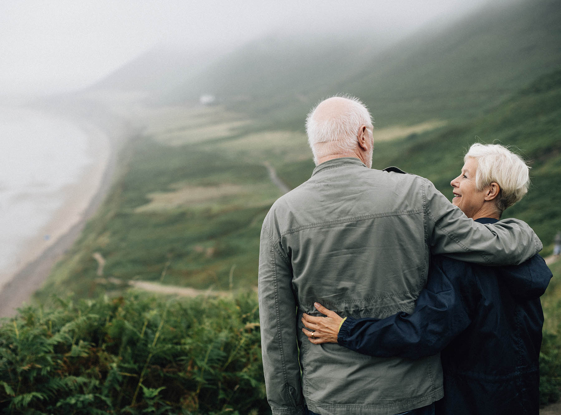 Happy senior couple enjoying a breathtaking view